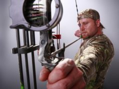 Archer with bow sight