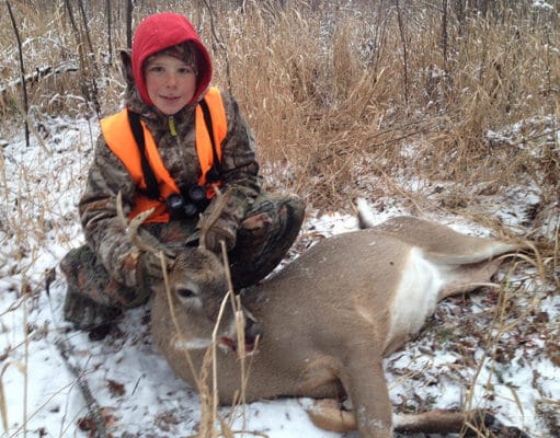 kid with a deer