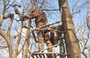 hunter on tree stand