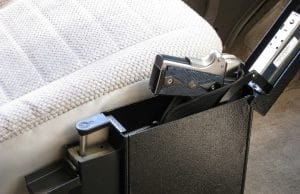 gun safe with pistol by car driver seat